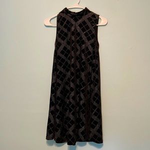 Velvet like mini dress with embellishments. Size M.